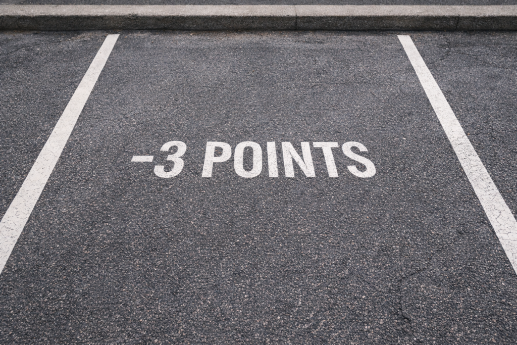 Place de stationnement illustrant la perte de 3 points pour stationnement dangereux au Mans